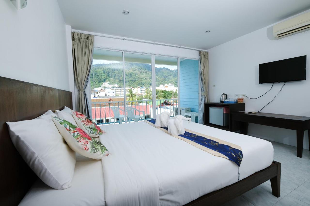 Kiwi Boutique Hotel Patong Exterior photo