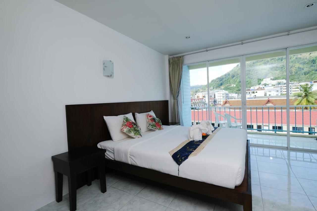 Kiwi Boutique Hotel Patong Exterior photo